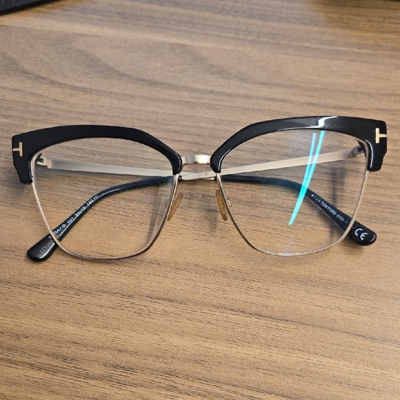 Tom Ford Elegant Black and Gold Women's Glasses